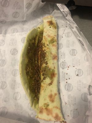 Green zataar manaeesh at Operation Falafel  in Abu Dhabi