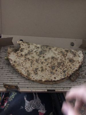 Oat dough manakish   at Operation Falafel  in Abu Dhabi