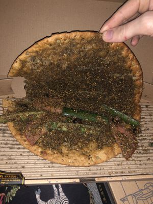 Oat dough manakish with veggies  at Operation Falafel  in Abu Dhabi