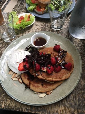 Pancakes with whipped coconut cream  at East St Cafe and Bar in Nelson