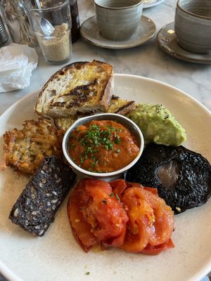 Minna breakfast; vegan black pudding, rosti, mushroom, avocado, home made beans, and sourdough toast  at Minna  in Liverpool