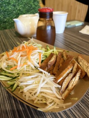  Rice rolls (hidden under salad)  at Nam Vegan Express in Burnaby