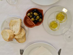 You get fresh bread, olives and olive oil to start as soon as you sit. at O Pelourinho in Alijo