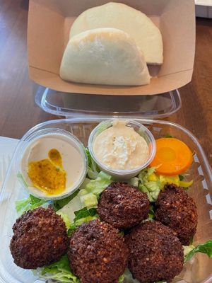 Falafel, salad and hummus at Falafel Salam in Seattle