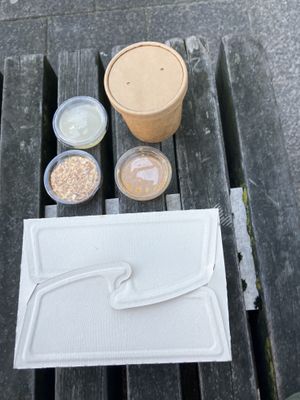 different sauces + soup   at Abu Amr Koshari  in Amsterdam