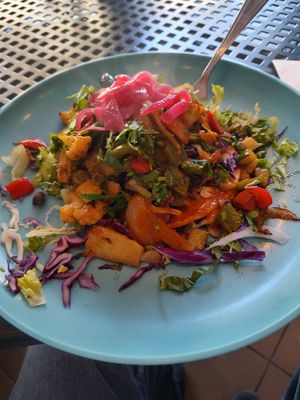 Vegan Tostada with cauliflower, zucchini, cabbage, lettuce, rice and beans. at Corazon Cafe  in San Luis Obispo