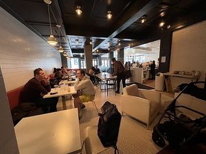 Inside lots of seating   at Atomic Coffee in Royal Oak