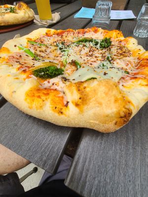 Vegan broccolini pizza with red pepper flakes at BrewDog in Canal Winchester