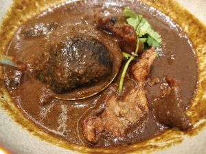 Peranakan signature dish - Buah Keluak at Whole Earth 环界蔬食 in Central Singapore