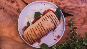 A LOTTA CIABATTA
Freshly sliced tomatoes on a traditional ciabatta bread, accompanied with fresh basil, vegan feta cheese, finished with salt and pepper. at Mood Cafe in London