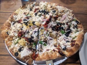 Veggie Specialty pie with soy cheese 🍕 at Little E's Pizzeria in Greensburg