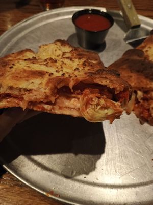 Stramboli with vegan cheese, pepperoni, artichoke & fire roasted tomatoes at Little E's Pizzeria in Greensburg