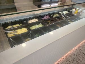 Salad and sauce options at Mr Potato Broadbeach in Broadbeach