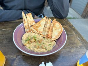 Hummus with roasted garlic   at Post And Row Eatery and Brewing Co in Dawson Creek