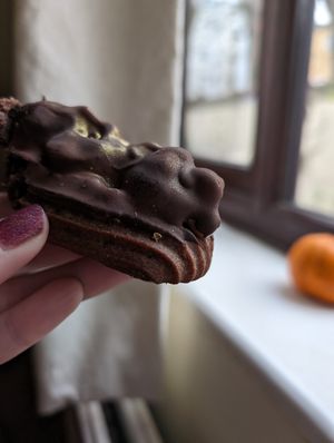 Snickers eclair at Busy V Bakery  in Bristol