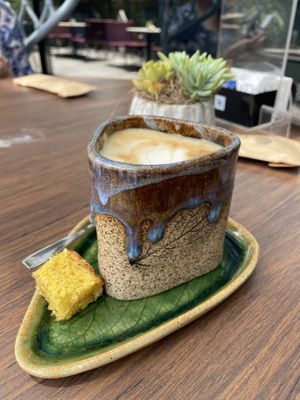 Delicious coffee that comes with the best chocotone I have ever tried  at YUCAFÉ in Sao Paulo