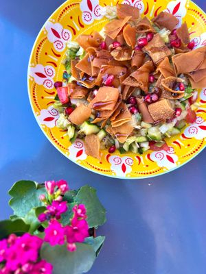 A refreshing blend of mint, toasted bread, and pomegranate seeds in a vibrant salad. at Tabla in Marseille
