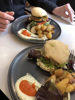 Burgers and patatas bravas  at Mango & Caoba in Barcelona