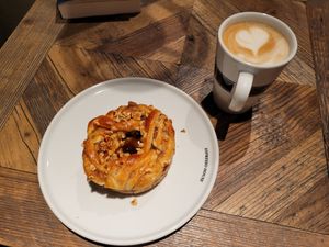 Apple and caramel bun and oat latte at Espresso House in Sarpsborg
