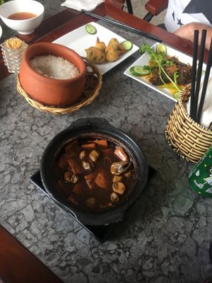 Pork in clay pot, mock fish with lemongrass and pan fried broccoli  at Tu Hanh in Da Lat