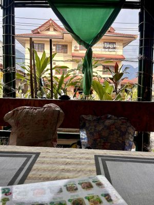 View from the comfy lounge table (shoes off)  at Veggie's in Vang Vieng