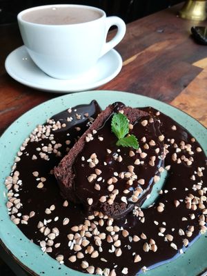 Brownie and hot choco with coconut milk at Parrhesia Cafe in Groningen