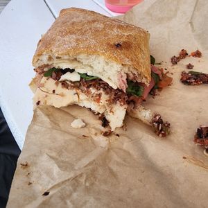 Not a great picture, but a great sandwich- my toddler had started tearing in before I took a picture! Crunchy pickled veggie muffuletta at BoardWalk Bakery in Orlando