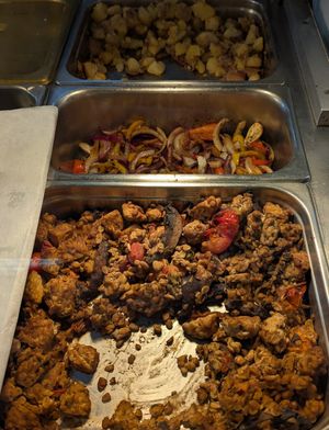 tempeh, onions (?), and potatoes at Heath's Natural Foods in New Smyrna Beach