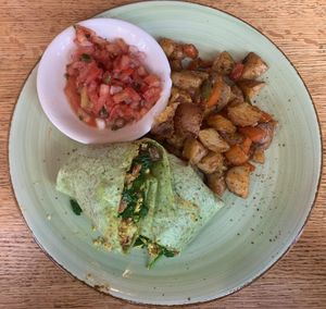 Vegan egg wrap and home fries  at Busboys and Poets - Shirlington in Arlington