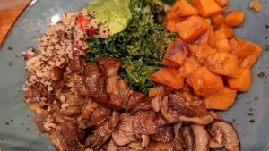 Vegetable Quinoa Bowl

Quinoa, grilled eggplant, asparagus, mushrooms, caramelized sweet potatoes, avocado, red peppers, kale, romesco vinaigrette at Busboys and Poets - Shirlington in Arlington