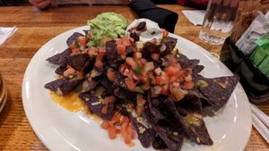 Vegan Nachos

Yellow corn chips, black beans, guacamole, vegan cheese, pico de gallo, vegan sour cream at Busboys and Poets - Shirlington in Arlington