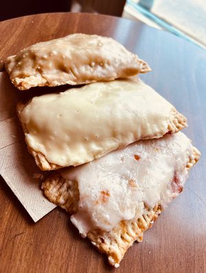 Pocket tarts!! From top to bottom: Caramel apple, mango passionfruit and ginger plum.  at Ruthie Roux Bakery - Pop Up in Dayton