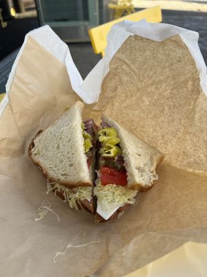 Build-your-own sandwich with vegan ham and cheese on sourdough   at Island Savoy Market in Alameda