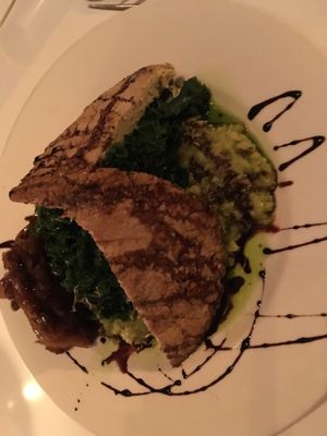 Chicken filet on mashed fava beans  at Peacefood Cafe - Downtown in New York City