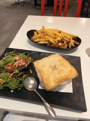Pot pie and cheesy fries   at Peacefood Cafe - Downtown in New York City