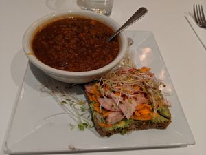 Truely delicious red bean chili with a side of rye, avocado, and veggies at Peacefood Cafe - Downtown in New York City