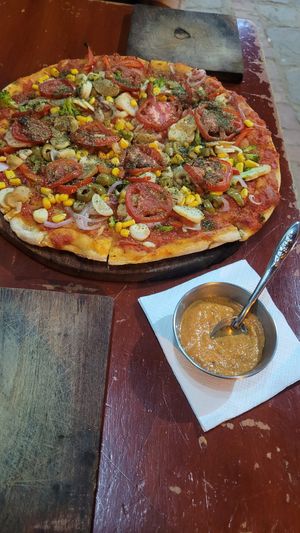 Pizza with Chillidip at La Pizzeria Samaipata in Samaipata