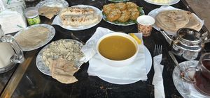 guava juice, flat bread, lentil soup, falafel, fries in a wrap (potato roll), tahinii  at Old Cairo in Cairo