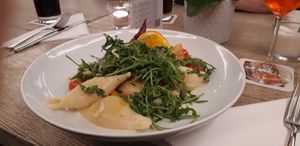 Muschelnudeln mit geschmortem Ofenkürbis, Kokos-Sauce, Rucola, Tomaten und Lauchzwiebeln at Zum Mühlenteich in Bassum