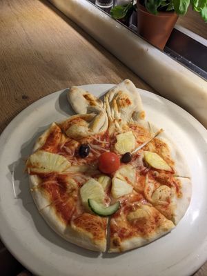 Rabbit pizza with vegan cheese at Vapiano - Foorum in Tallinn