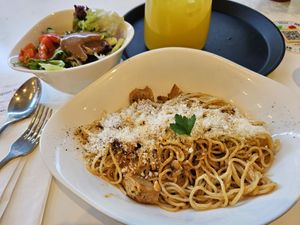 Pasta crema no pollo and side salad at Vapiano - Foorum in Tallinn