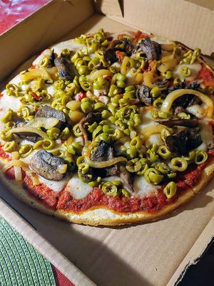 Custom pizza, a special. He also had a wonderful roasted cauliflower wrap as a special. Very easy to order online. at iCreate Cafe in Pottstown