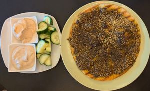 Za'atar Mana'eesh with baba ghanouj, hummus, and cucumbers at iCreate Cafe in Pottstown