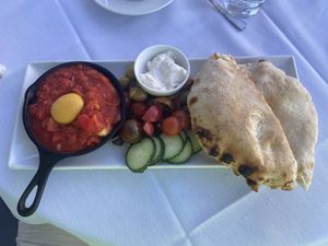 Mike’s Shakshuka - the pita is insane!  at Crossroads Kitchen in Los Angeles