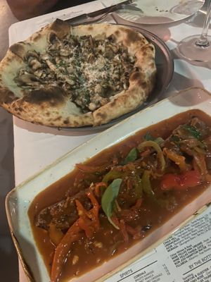 Truffle pizza and home made Italian sausage  at Crossroads Kitchen in Los Angeles