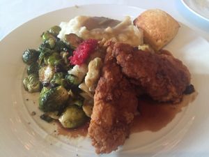 Southern Fried ";chicken"; MASHED POTATOES porchini gravy  CLASSIC STUFFING -- (GF optional)  BRUSSELS SPROUTS crispy shallots/ currants / maple mustard glaze  SWEET POTATO BISCUIT at Crossroads Kitchen in Los Angeles