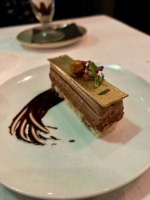 Chocolate & Hazelnut Petit Gateau, w/ hazelnut biscuit, hazelnut crunch, cremeux Nutella and mousse. at Crossroads Kitchen in Los Angeles