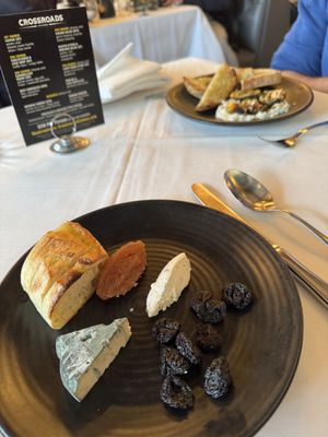 Cheese plate with oily bread  at Crossroads Kitchen in Los Angeles