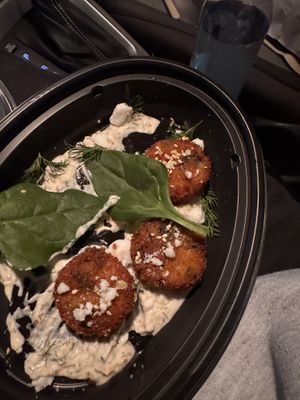 Spinach artichoke arancini with dill feta sauce  at Crossroads Kitchen in Los Angeles