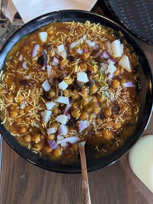 Vegan Aloo Tikki Chaat - Potato Hashbrowns with Chickpeas topped onions and chutneys  at Jannat-E-Punjab in Guelph
